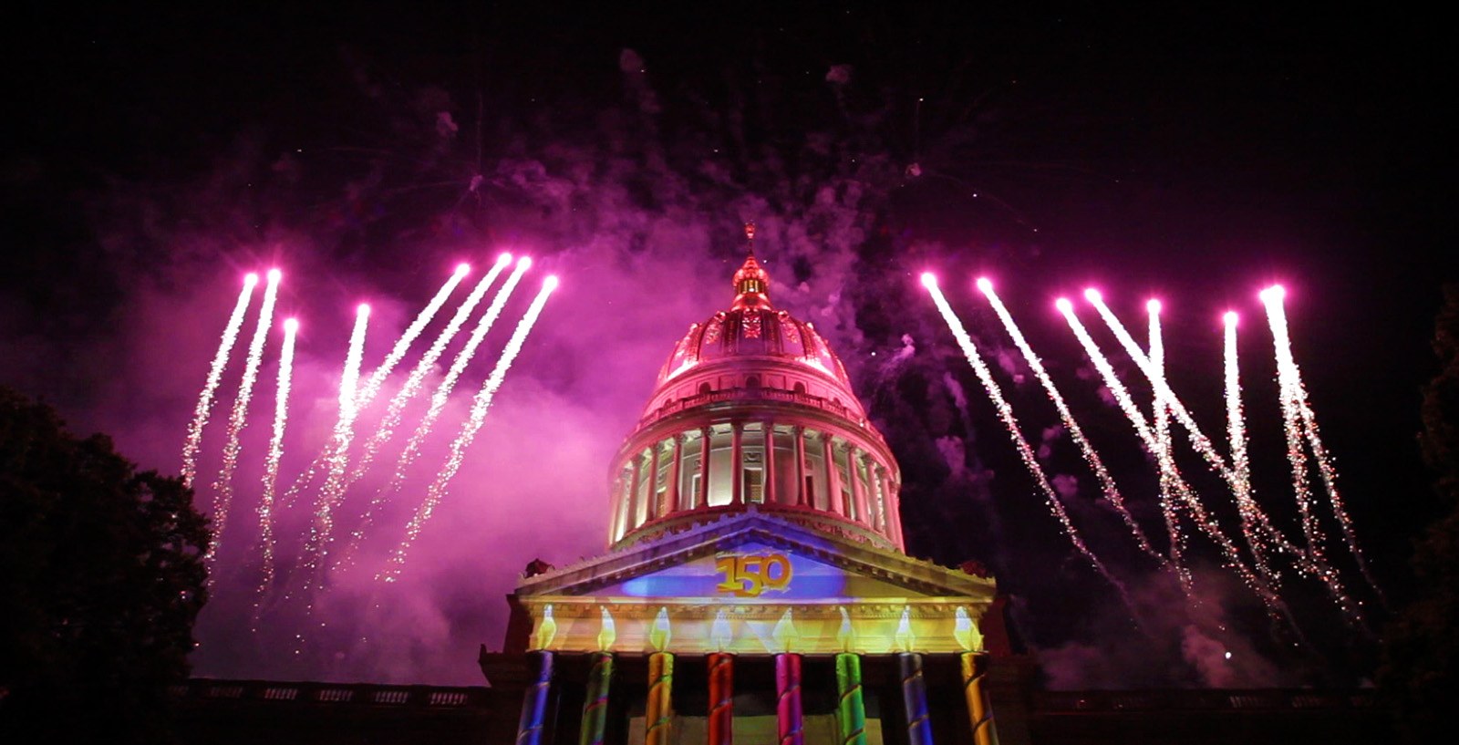 The illuminated capitol and fireworks